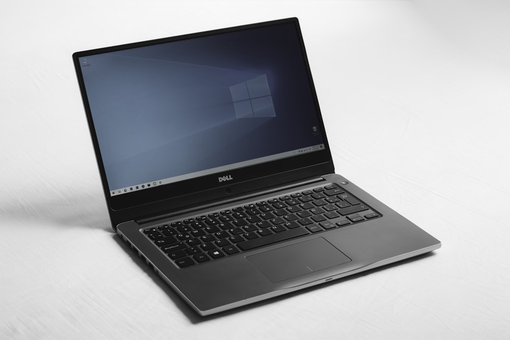 Laptop open on a service desk
